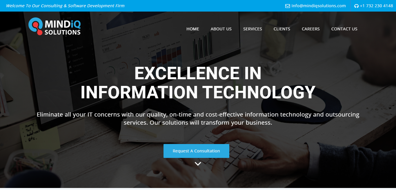 MINDIQ Solutions IT services website with dark hero area